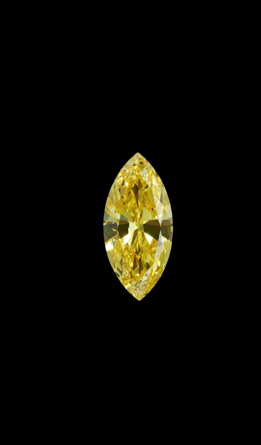 Fancy Vivid Yellow lab-grown diamond, marquise cut, on black velvet — IGI Fancy Vivid certified