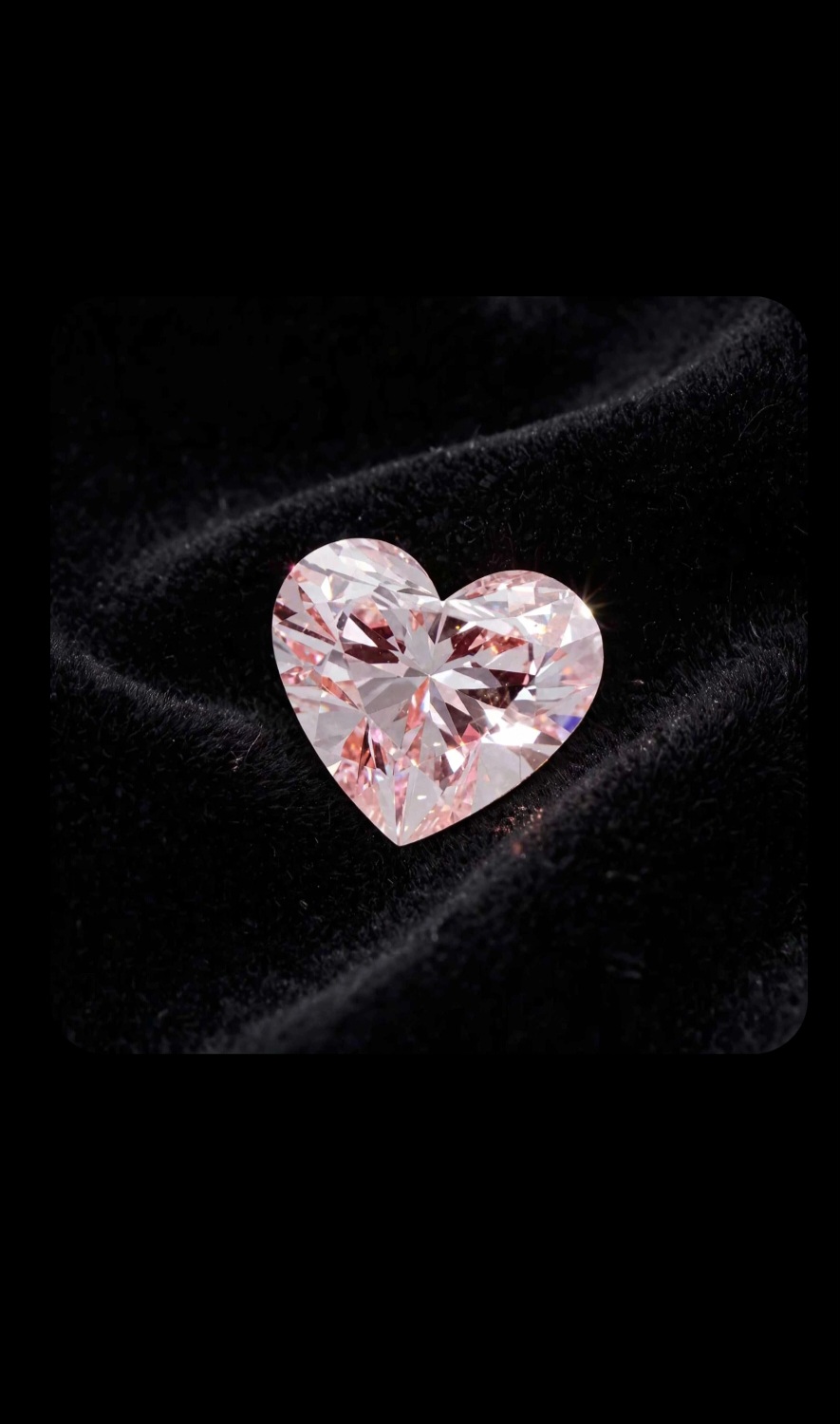 Fancy Vivid Pink lab-grown diamond, heart cut, on black velvet — IGI Fancy Vivid certified