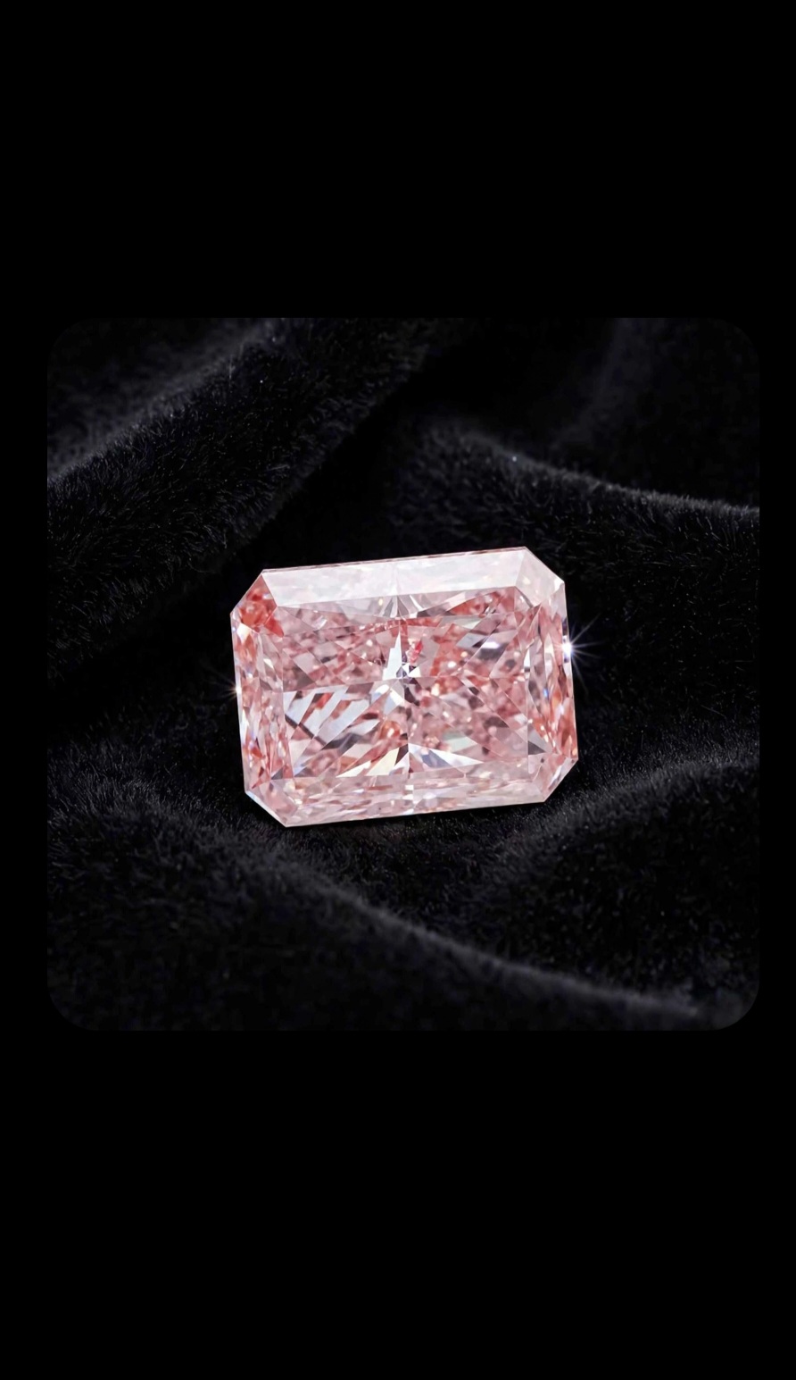 Fancy Vivid Pink lab-grown diamond, radiant cut, on black velvet — IGI Fancy Vivid certified
