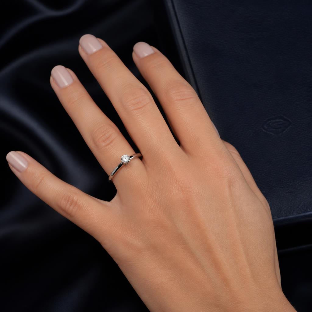 0.5 ct natural diamond ring on a finger